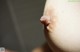 A close up of a woman's breast with a small lump on it.